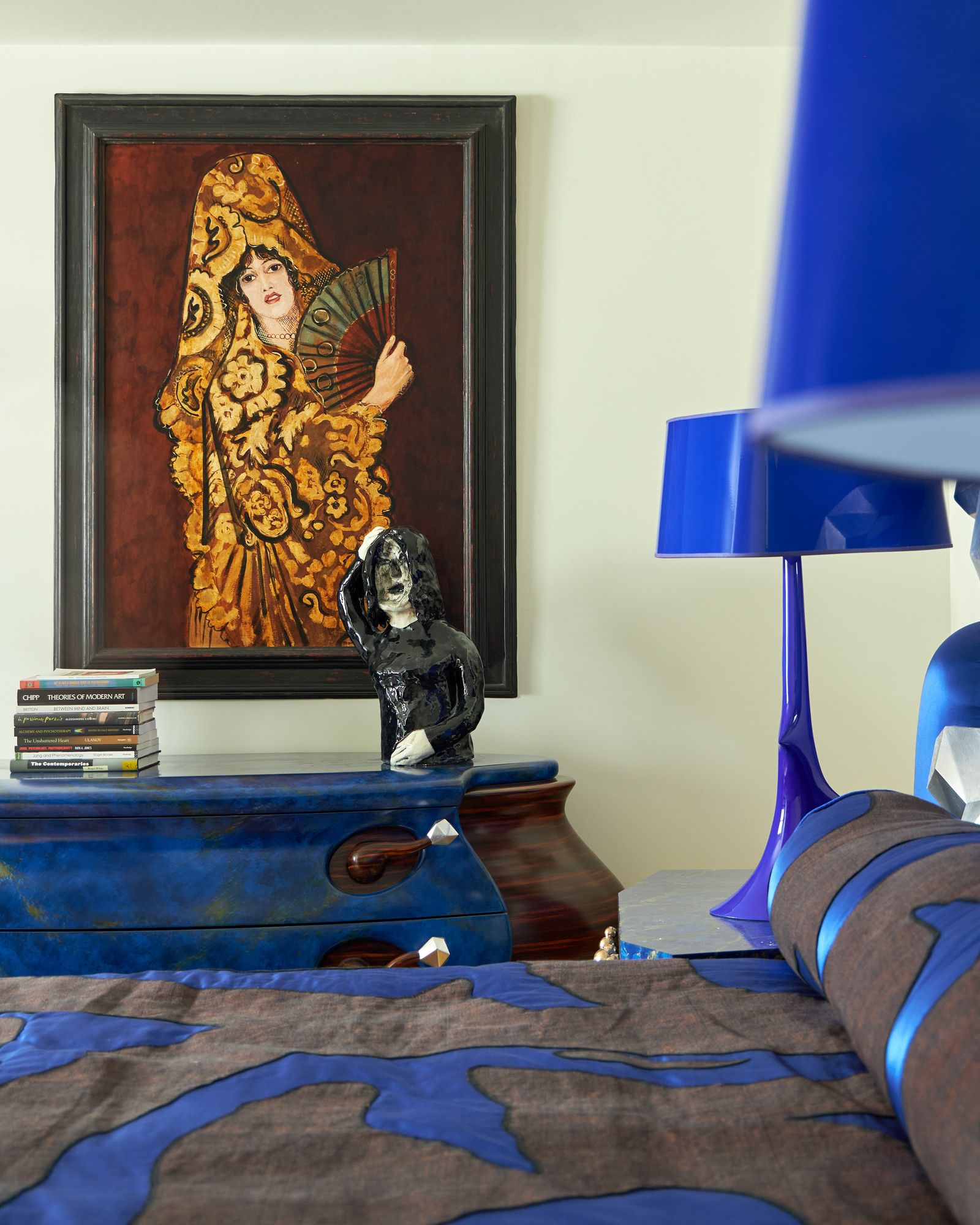 Image may contain Sappho Indoors Interior Design Art Painting Lamp Table Lamp Adult Person Wedding and Furniture