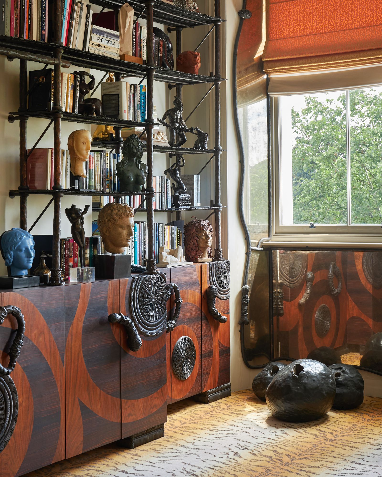 Image may contain Lorenzo Bartolini Scopas Charles II of Spain Furniture Bookcase Person Indoors and Interior Design