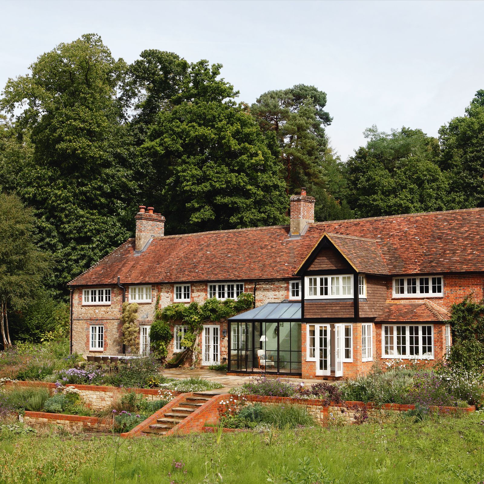 An Arts & Crafts house in Surrey given a fresh spirit by Studio Peake