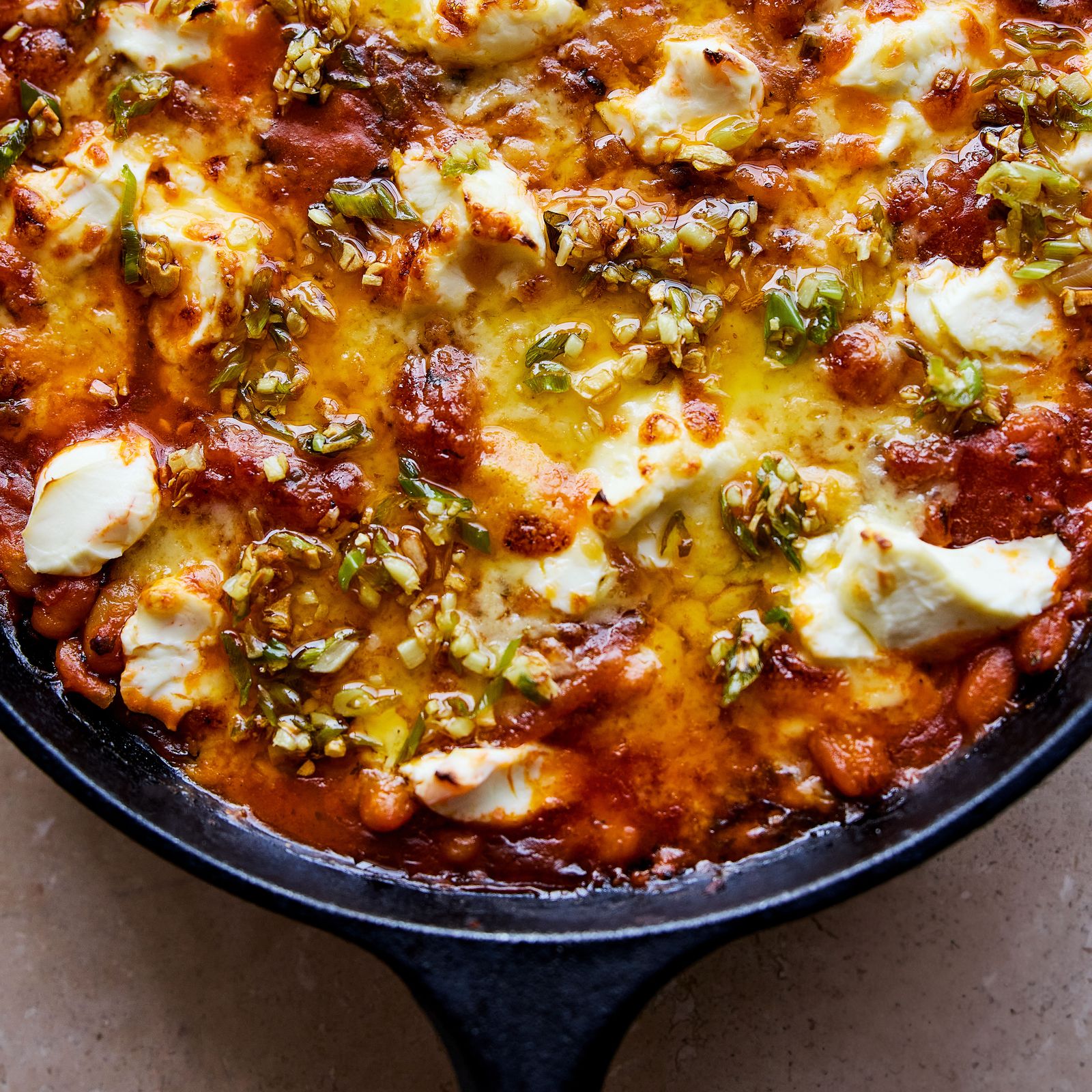 Arabic baked beans with tomato and cheddar