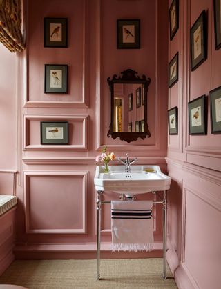 In the small downstairs bathroom in a Norfolk country house Carlos Garcia has cleverly saturated the walls in a rich...
