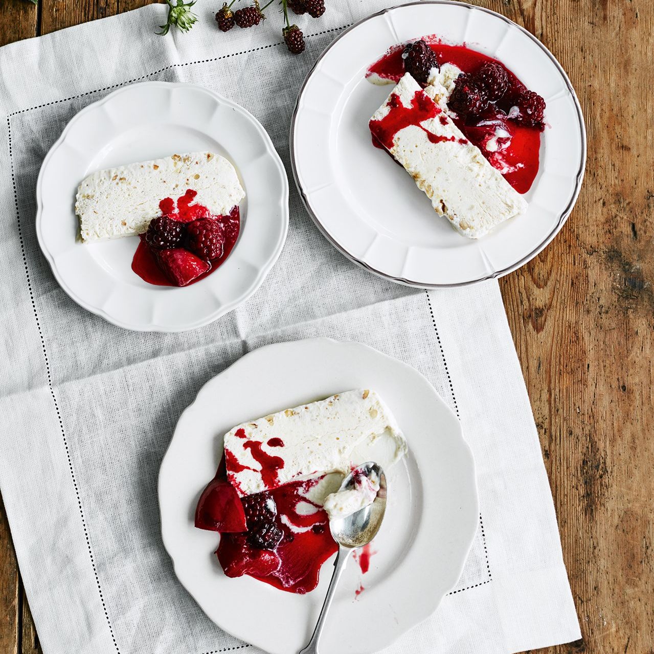 Iced praline parfait with plum and blackberry compote
